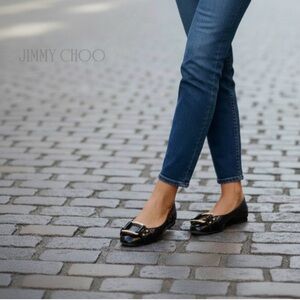 Jimmy Choo Flats with extreme fashion gold buckle. They go with everything!